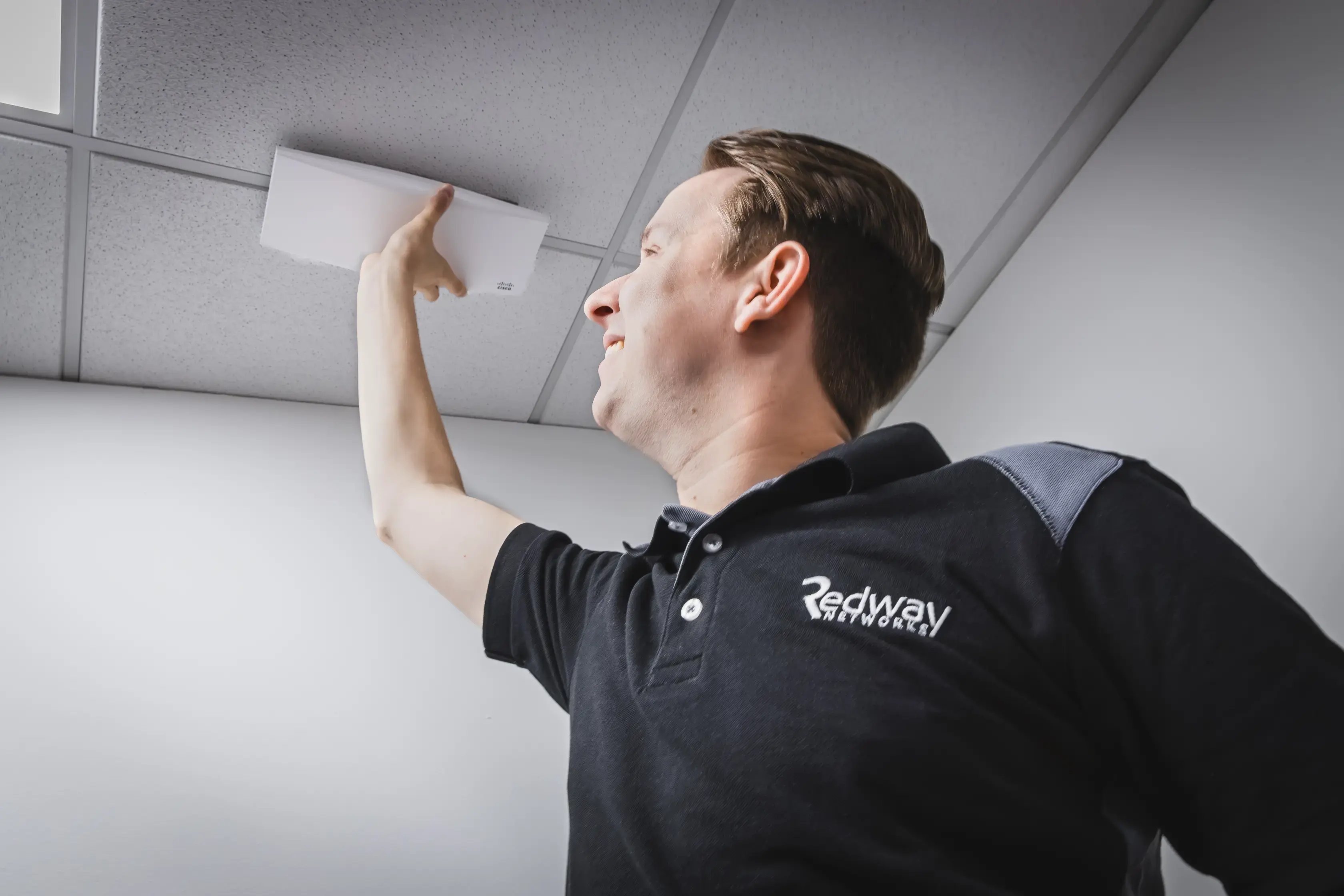 Redway Engineer Installing Access Point