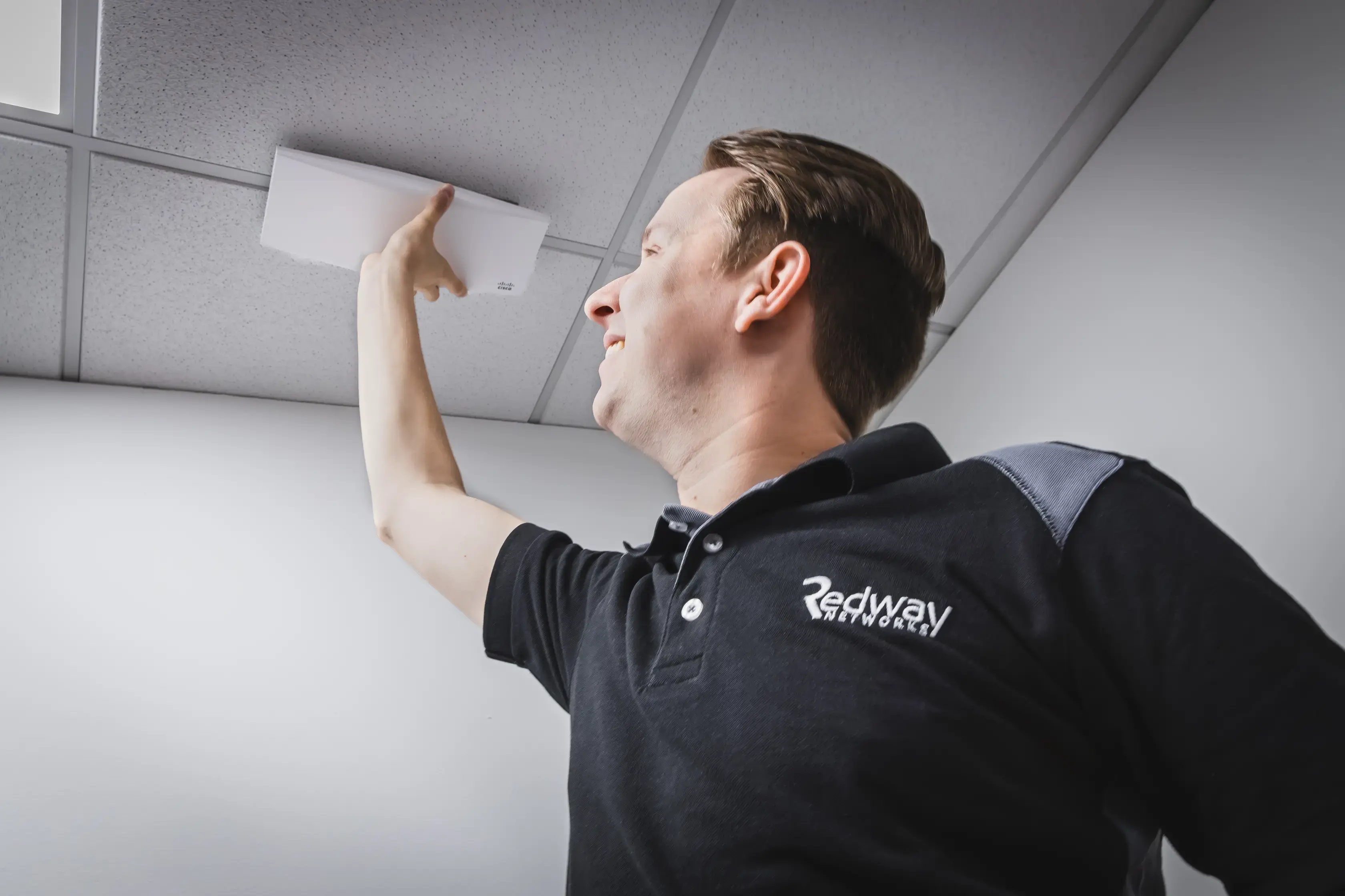 Redway Engineer Installing Access Point